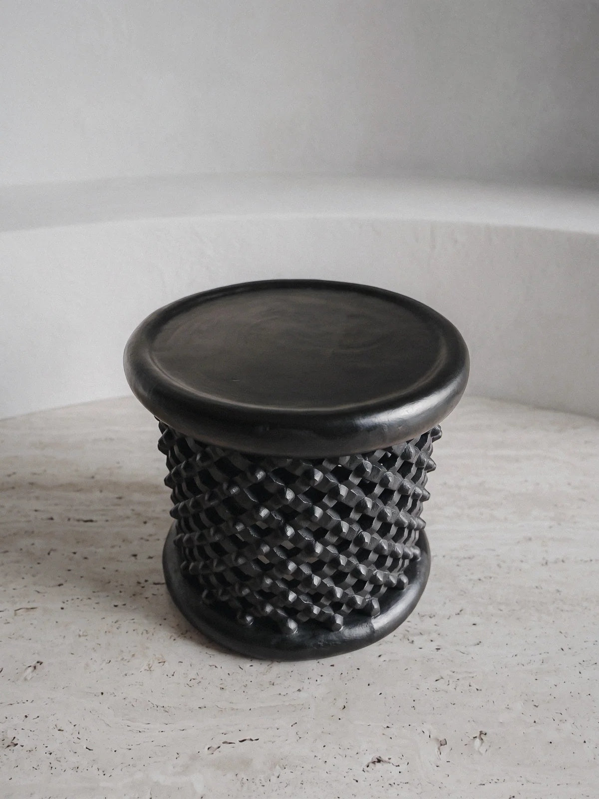 Sculptural Monolithic Stool — Ebonized Hand-Carved Timber
